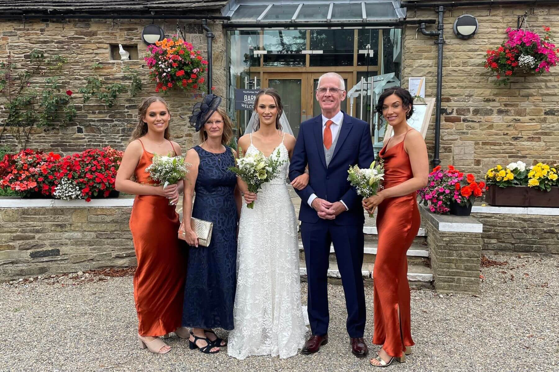 Bride-with-parents-and-bridesmaids
